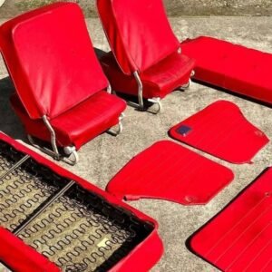 beetle interior. Re covered in red some years back. Good rust free seat frames. Upholstery not perfect but you can put it in and use it.